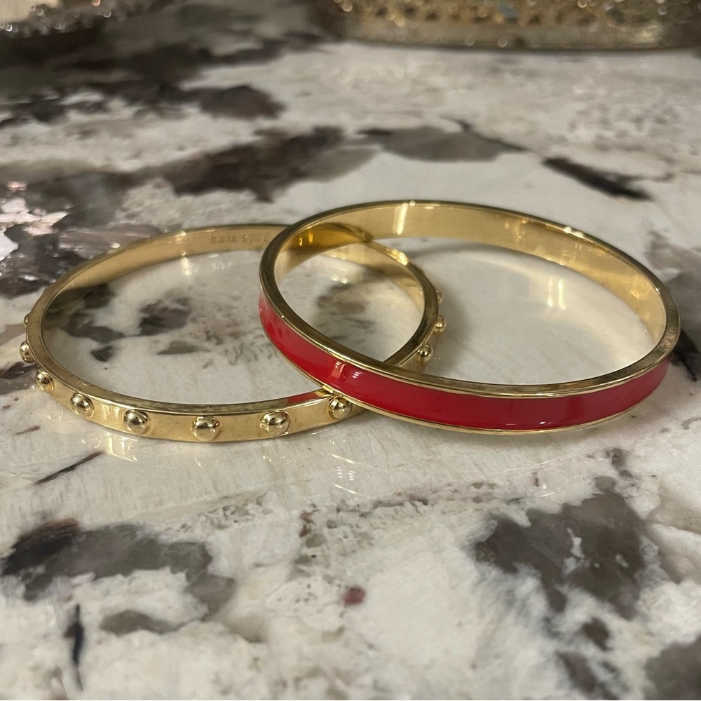 Two Kate Spade New York Gold and Red Bangle Set